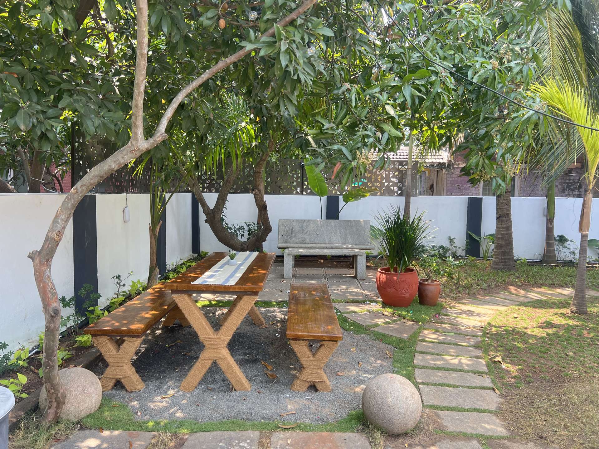 Outdoor dining table in the morning at The Bella Vista